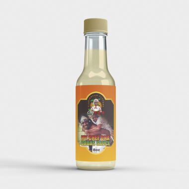 A bottle of mustard with the label " spicy mama ".